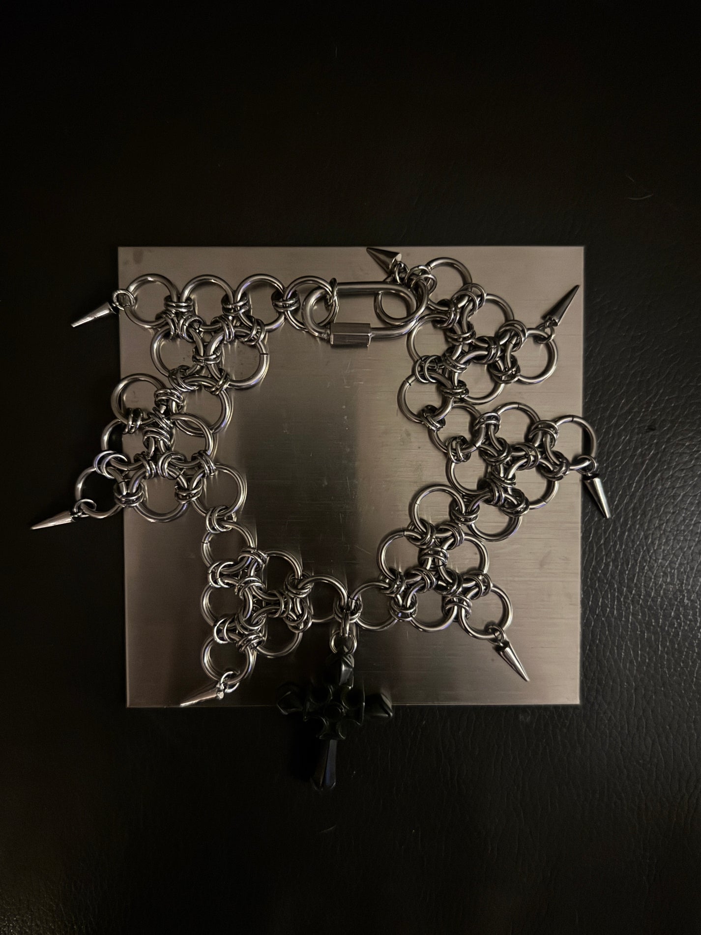 jade cross jester necklace